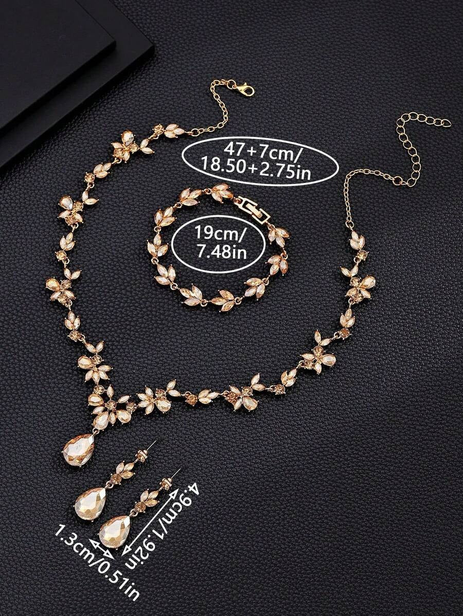 مجموعة مكونة من 4 قطع من المجوهرات الأنيقة والأنيقة المزينة بالراين والزجاج، تشمل قلادة وأقراط وسوار، مناسبة لمناسبات الزفاف والحفلات والسهرات للنساء